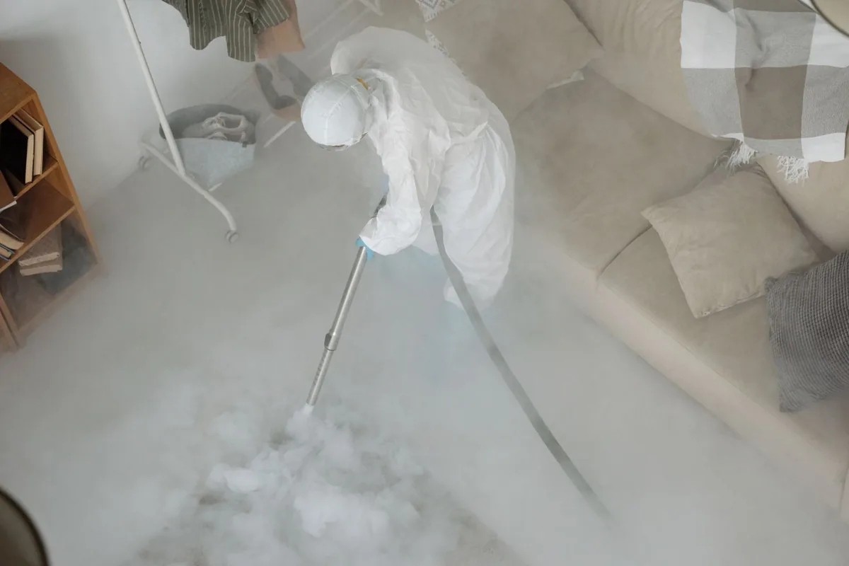 Biohazard cleanup technician in protective equipment, Aloha, OR